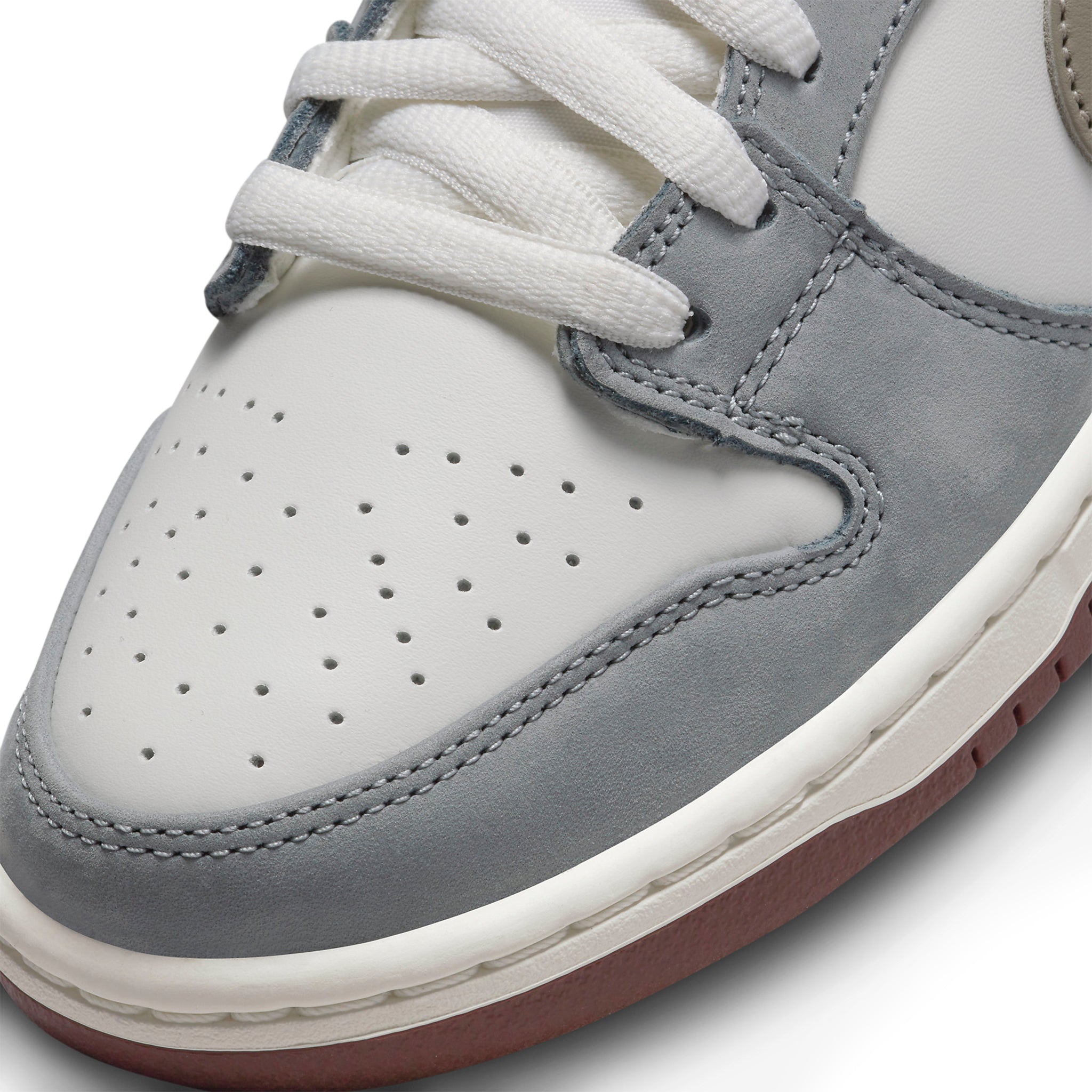 Toe box view of Yuto Horigome x Nike SB Dunk Low FQ1180-001